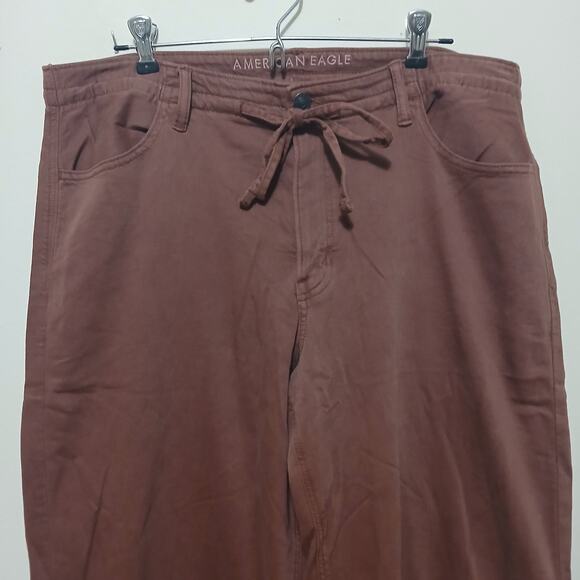 American Eagle Dreamy Drape Low-Rise Ultra Wide-Leg Jean Size 12 Dark Rust Boho - Picture 2 of 9